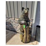 Wooden sculpture of bear 5 ft tall and roughly 20 inches round at base