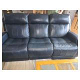 Blue leather power reclining John V. Schultz sofa with built in speakers and charging ports