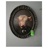 24" Oval framed cow wall art