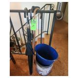 Small trash cans, 2 canes, umbrella
