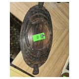 antique Anglo-Indian or Indochinese hand-carved wooden serving tray, often featuring intricate floral or mythological motifs such as dragons.