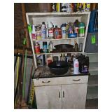 Metal storage cabinet with contents