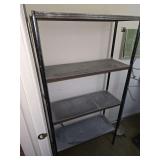 Contents of bathroom. Metal shelf, wall mirror, vintage drying rack, vacuum