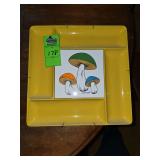 vintage 1970s melamine divided relish tray featuring a decorative ceramic tile with a mushroom design, often associated with the "Merry Mushroom" style popular during that era.