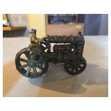 vintage cast iron Fordson-type toy tractor, likely dating from the 1920s-1930s or a later reproduction.