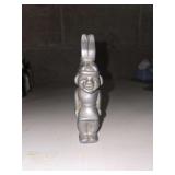 vintage Iroquois Beverage Company bottle opener, featuring a figural Indian Head mascot.