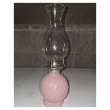vintage Kaadan LTD oil or kerosene lamp with a distinct pink, swirled glass base.
