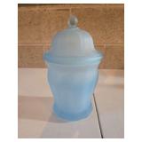 Vintage Indiana Glass satin blue paneled apothecary canister jar with a lid.