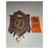 Vintage miniature cuckoo-style pendulette clock