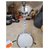 vintage 5-string open-back or bottlecap-style banjo featuring a Remo Weather King banjo head. Needs strings