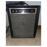 vintage 1960s Sears Silvertone Model 257 solid-state guitar amplifier (often rated around 5 watts).
