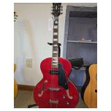 Grote semi-hallow electric guitar with stand