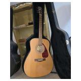Yamaha F325 acoustic guitar in case