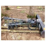 Skid steer earth auger / post-hole digger attachment equipped with a hydraulic drive unit, a universal quick-attach mounting plate, hydraulic hoses, and spiral auger bits.