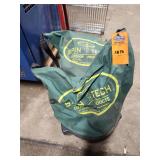 2 SpinTech outdoor seeder and wildlife feeder bag spreader unit featuring a green fabric hopper and a patented bottom-spin