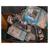 Various makita drills, batteries, and chargers