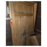 Door and large rolls of butcher paper