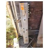 Motorcycle stand and battery handler