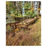 Heavy-duty yellow flatbed tag-a-long trailer