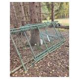 Fence with barbed wire top