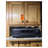 Contents of cupboard and 3 drawers. Stereo NOT included