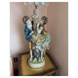 AI Overview        The selected region appears to show a vintage Hollywood Regency-style waterfall crystal and brass chandelier topper, resembling mid-century accent lamps by makers like Loevsky & Loe