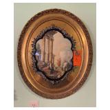 This appears to be a vintage framed oval print depicting Roman architectural ruins in the capriccio style, reminiscent of the works of 18th-century painter Giovanni Paolo Pannini, housed in an ornate 