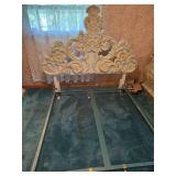 This is an ornate vintage French Rococo-style carved wooden headboard with a distressed off-white or light green finish. Matching armoire big dresser two wall hung mirrors and a side stand.