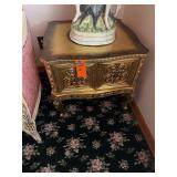 AI Overview        This appears to be an ornate, vintage-style French Rococo or Hollywood Regency gilded accent cabinet featuring intricate scroll carvings and cabriole legs. [1] (https://www.ebay.com