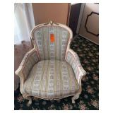 AI Overview        This is a vintage French Provincial or Louis XV style armchair featuring a painted cream wood frame and striped floral upholstery. [1] (https://www.rubylane.com/item/3258328-301/Vin
