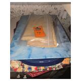 Various placemats, and glass cutting board