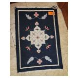 Small rug and fall wreath