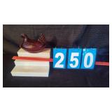 RUBY REDHEND ON NEST COVERED DISH