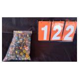 BAG OF MIXED SIZED MARBLES