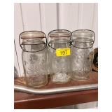 3-Atlas ï¿½good luckï¿½ glass lid mason jars OLD