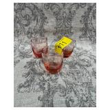 3 pink shot glasses