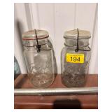 2- Ball ideal glass top mason jars OLD