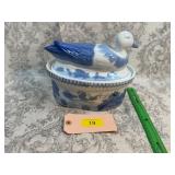 Blue and white stoneware duck covered dish