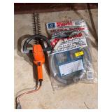 Electric hedge trimmer & flexible conduit