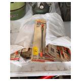 Bag of Coleman unleaded stove generator