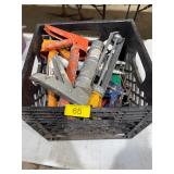 Crate of caulk guns
