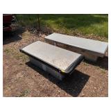 Two diamond plated truck toolboxes