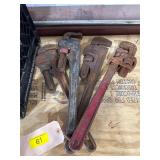Four pipe wrenches