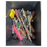 Box partially full of screwdrivers etc