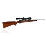 Remington Model 700 .243 Winchester Rifle w/ Prohunter 6-18x40 AO Scope	145924