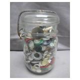 Glass Jar Filled With Assorted Buttons