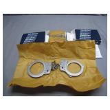 Two Smith & Wesson M100 Handcuffs