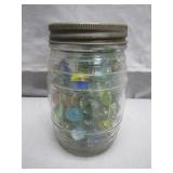 Glass Jar of Multicolored Marbles