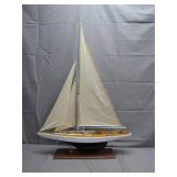 Handcrafted Model Sailboat with Intricate Details