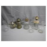 Four Clear Glass Oil Lamps